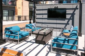 Sundeck with tv lounges and fire pit
